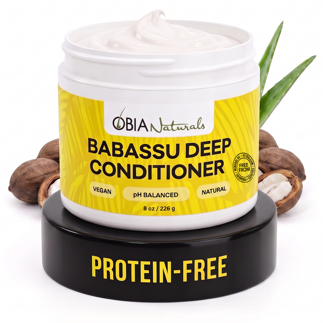Open jar of OBIA Naturals Babassu Deep Conditioner on a pedestal with babassu nuts, the worked label example in this guide