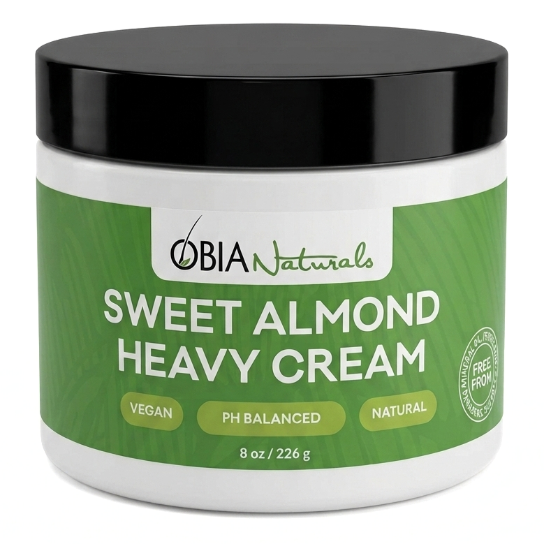 OBIA Naturals Sweet Almond Heavy Cream bottle — rich, vegan leave-in conditioner for dry, coarse hair