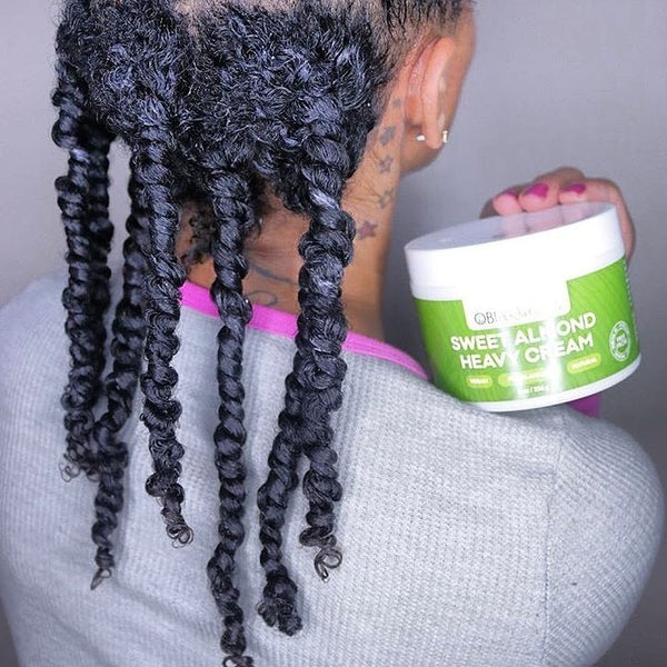 Customer holding OBIA Sweet Almond Heavy Cream
