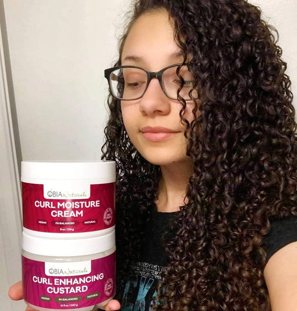 Customer with soft, defined curls after a wash day with OBIA
