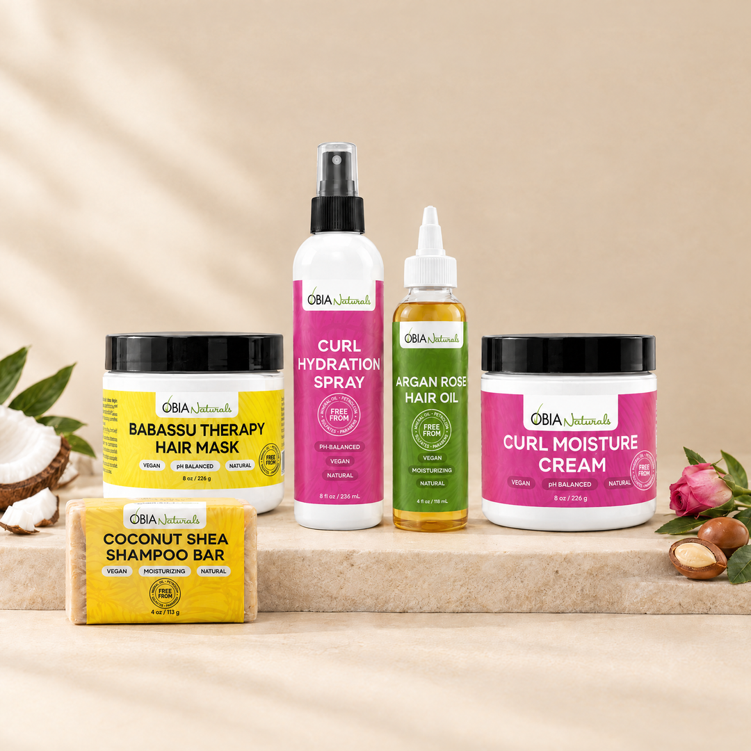 Type 3 Moisture Bundle on a stone plinth: Coconut Shea bar, Hair Therapy Mask, Hydration Spray, Argan Rose Oil, Curl Cream