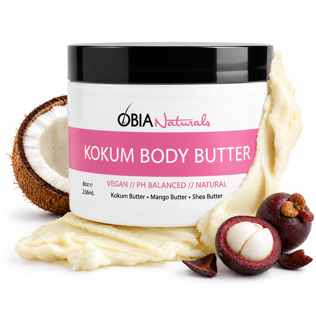 OBIA Naturals Kokum Body Butter jar resting in whipped body butter beside a halved kokum fruit