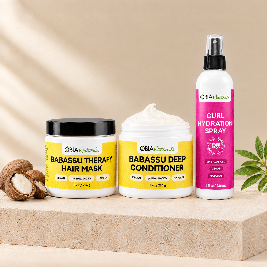Wash Day Reset: Babassu Hair Therapy Mask, Babassu Deep Conditioner and Curl Hydration Spray on a stone plinth